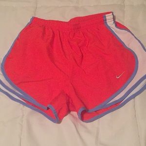 Bright red Nike shorts